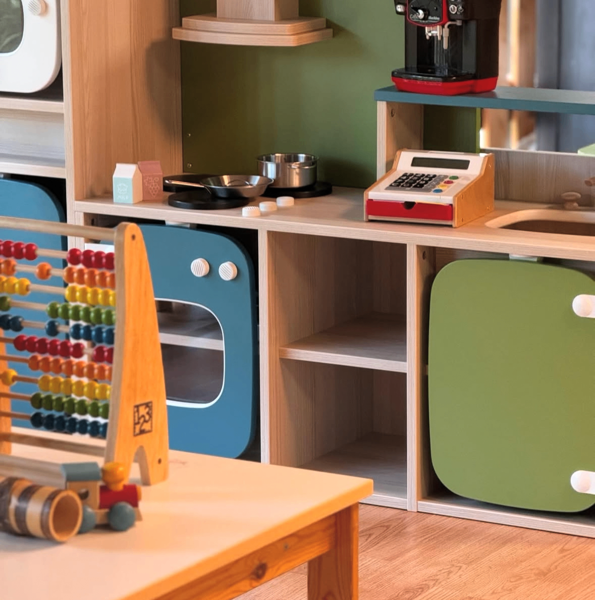 Light-wood Montessori corner with practical life toys